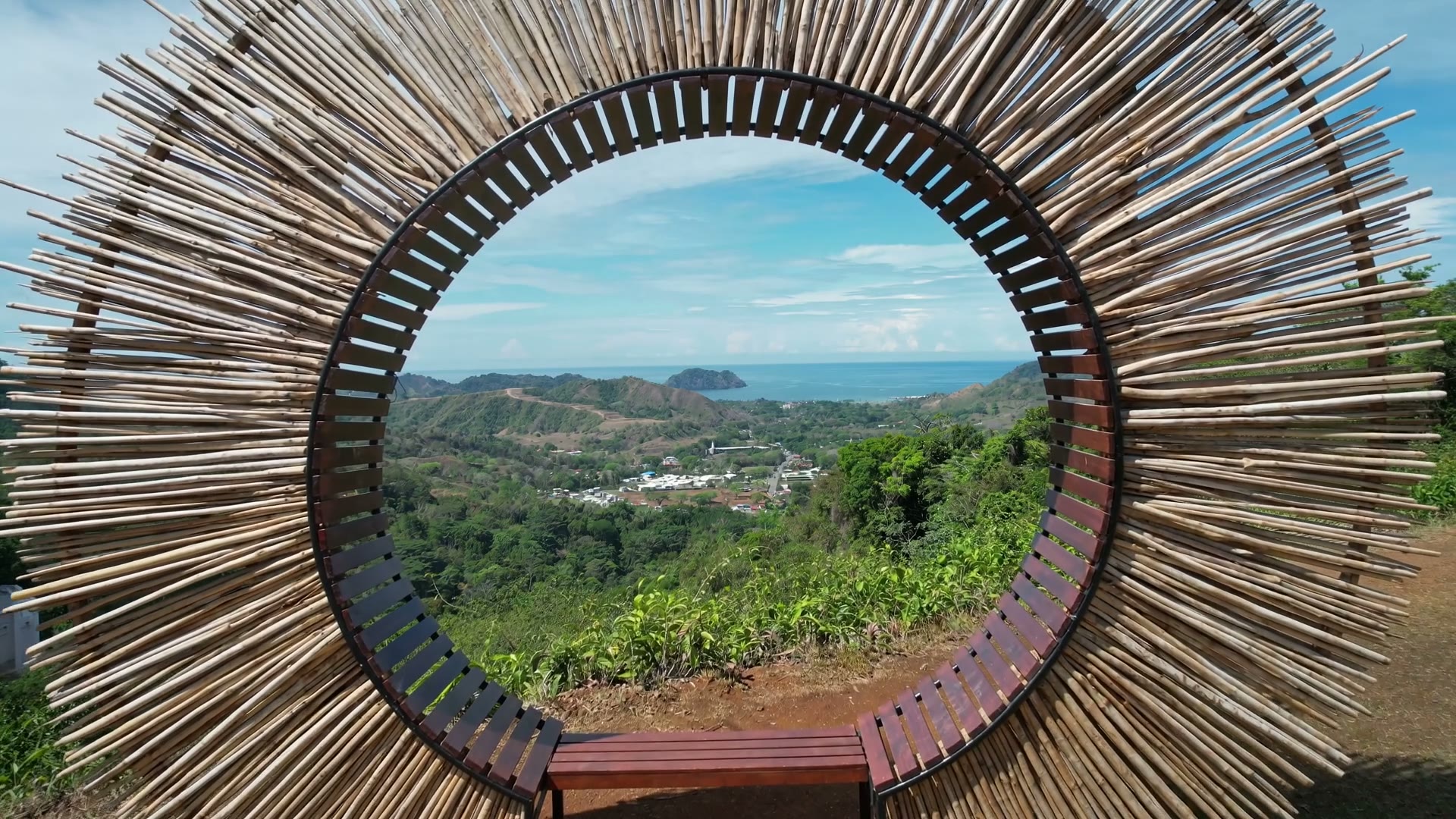 Aerial view of Herradura Bay and the rainforest above Vista Los Sueños Adventure Park